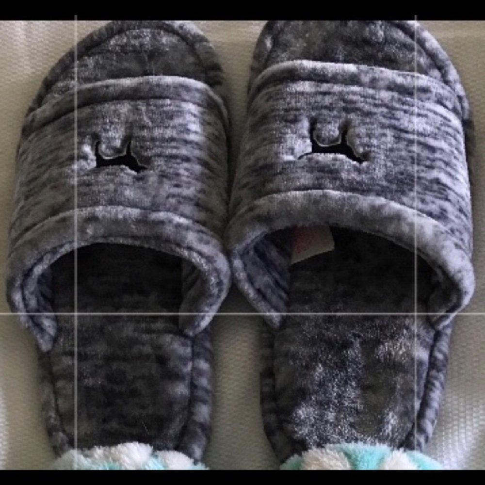 Two pairs of slippers, never worn. Brand new.